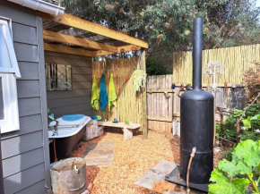 Petlyn eco cottage is an off grid petfriendly cottage with an outdoor tub